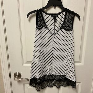 Women’s size S White House Black Market sleeveless knit top.  ECU.